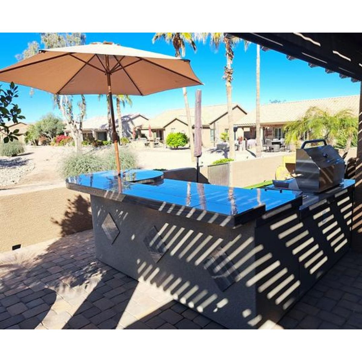 The outstanding Kokomo Aruba BBQ Island with Built In BBQ Grill Side Burner and Refrigerator.