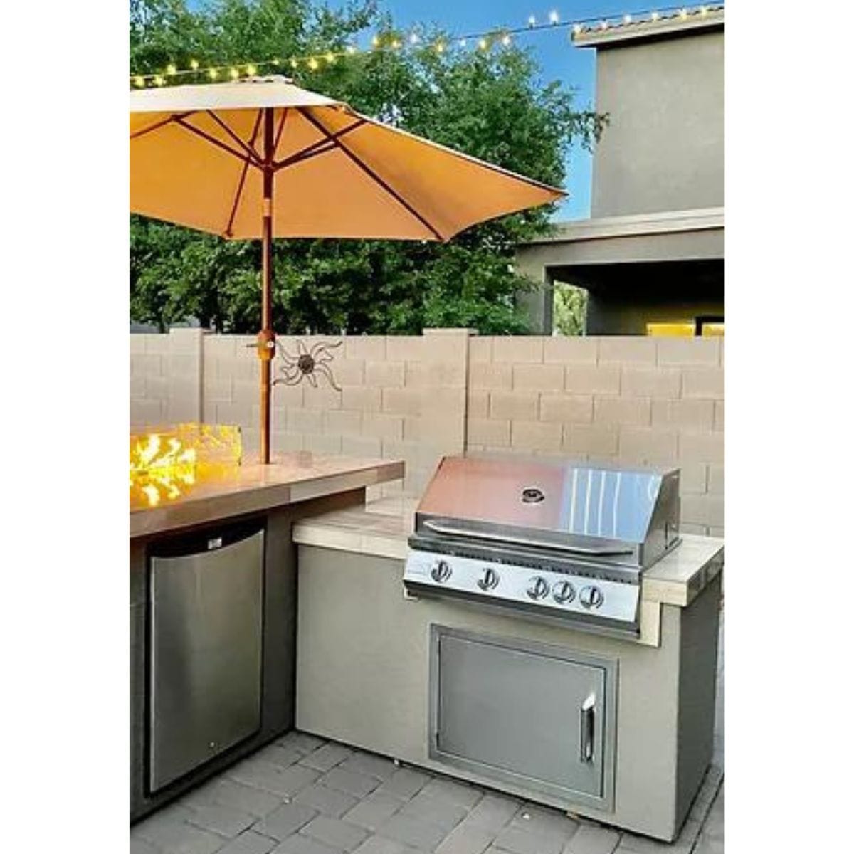 Featuring the Kokomo Baja/Fire L-Shaped BBQ Island with Fire-pit, 4 Burner BBQ, Outdoor Refrigerator