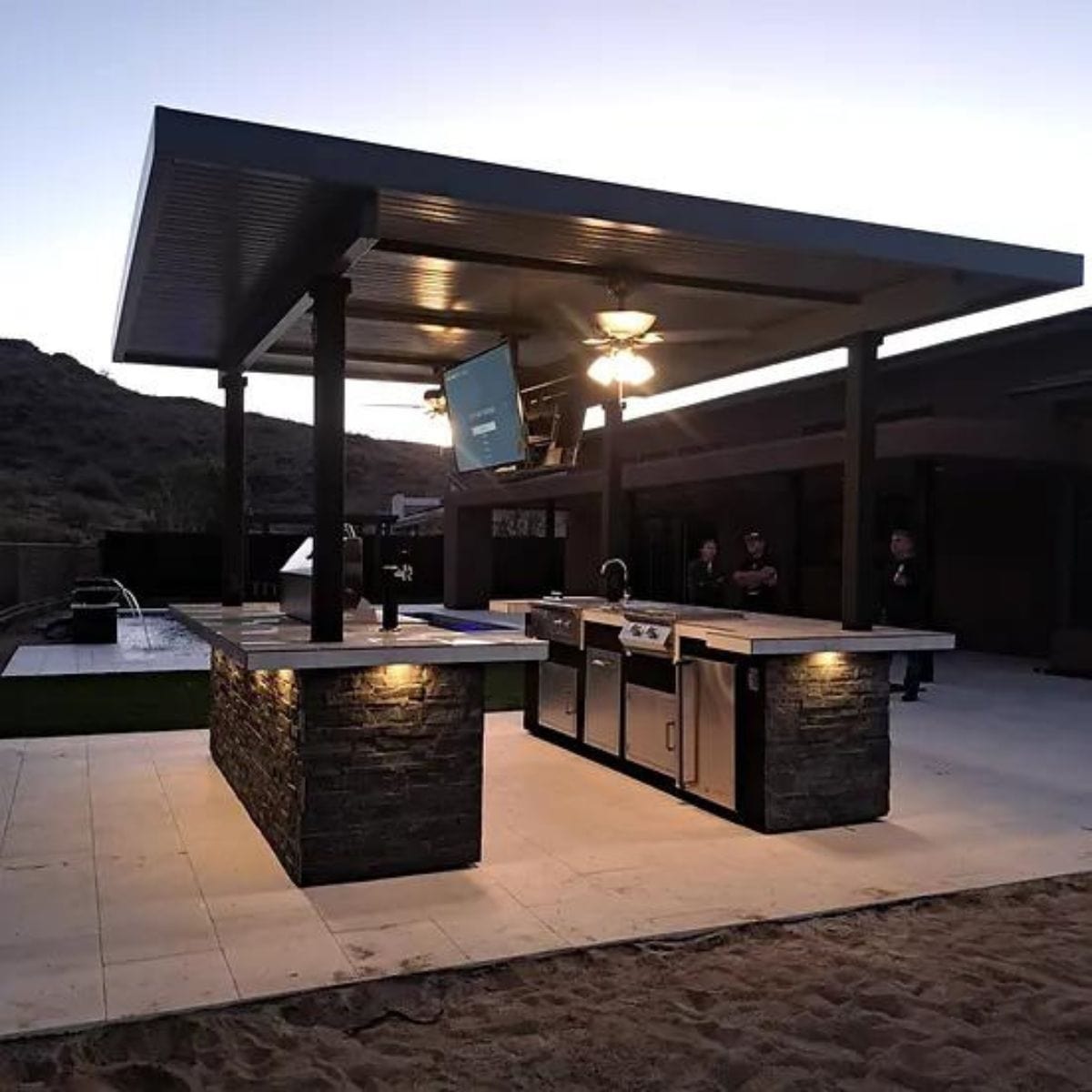 Grill comes installed, stainless steel doors come installed in BBQ Island.
