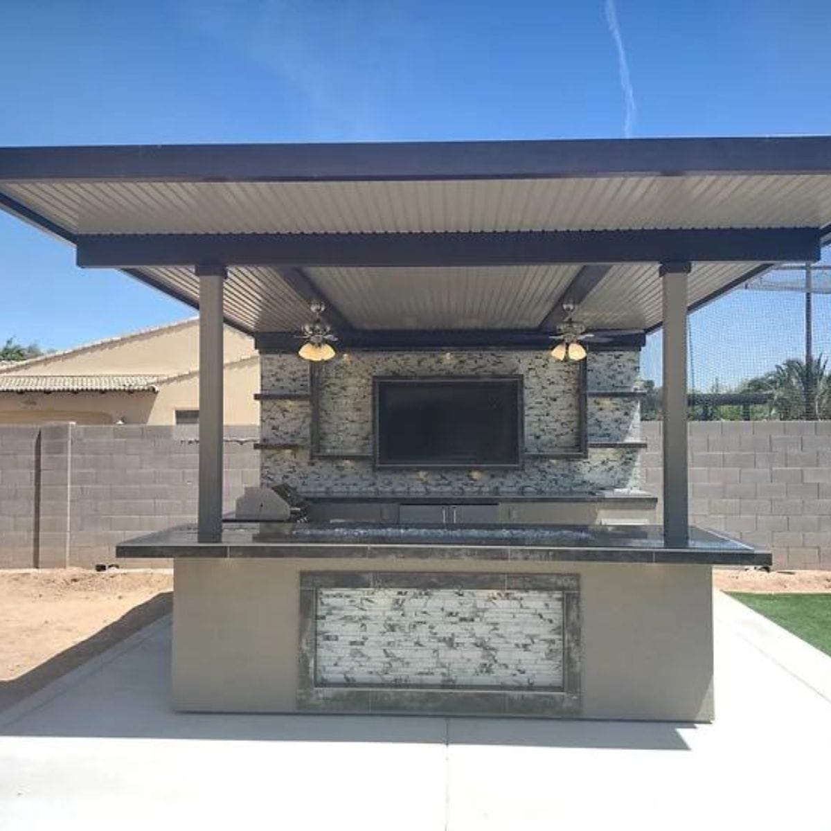 Introducing the Montego Model Outdoor Kitchen BBQ Island, complete with a high-quality BBQ grill.