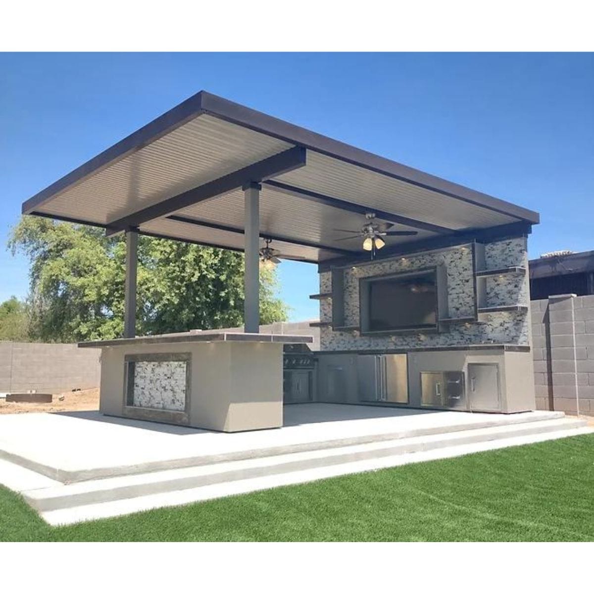 The Montego Model Outdoor Kitchen BBQ Island features a sleek and functional design, providing ample space for cooking, dining, and socializing.