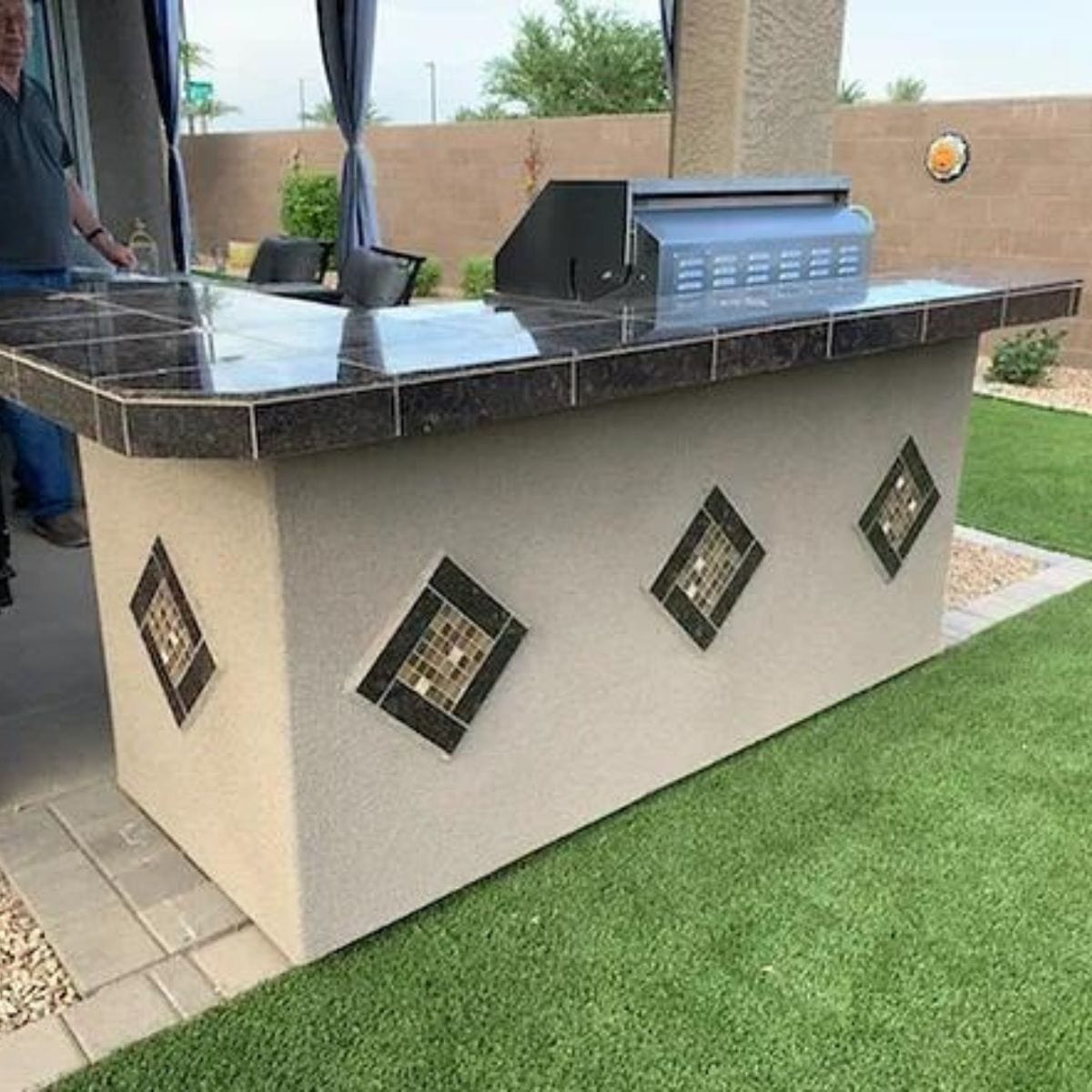 This is the finest Kokomo St. John 7'6" BBQ Island W High Bar on three sides and Lights 4 Burner BBQ Grill.