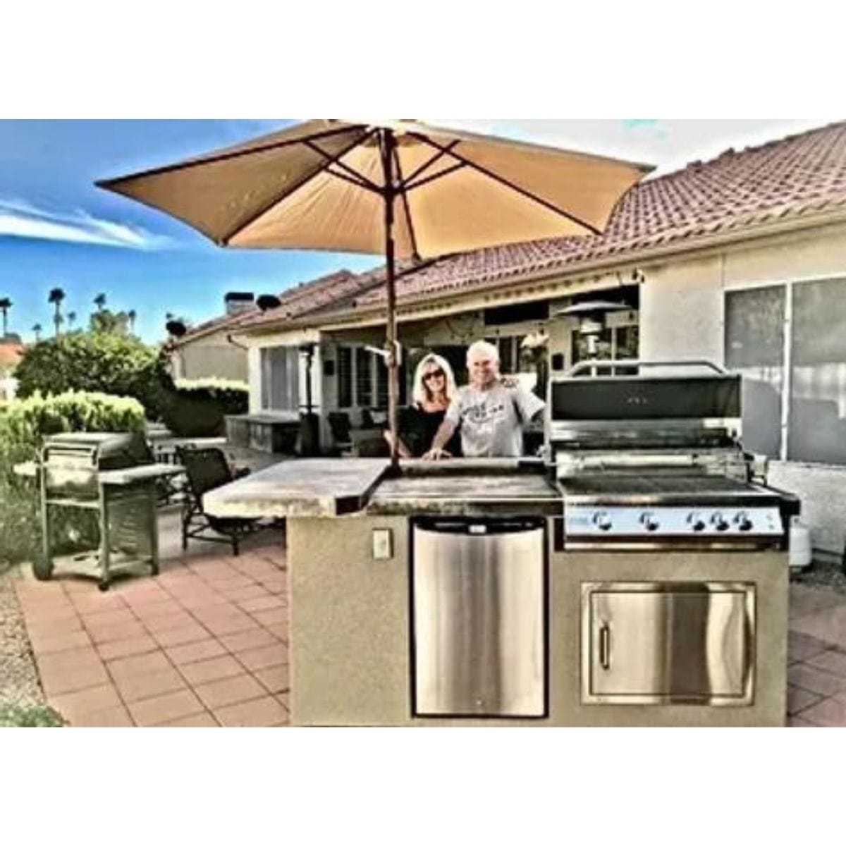 This is the finest Kokomo St. John 7'6" BBQ Island W High Bar on three sides and Lights 4 Burner BBQ Grill.