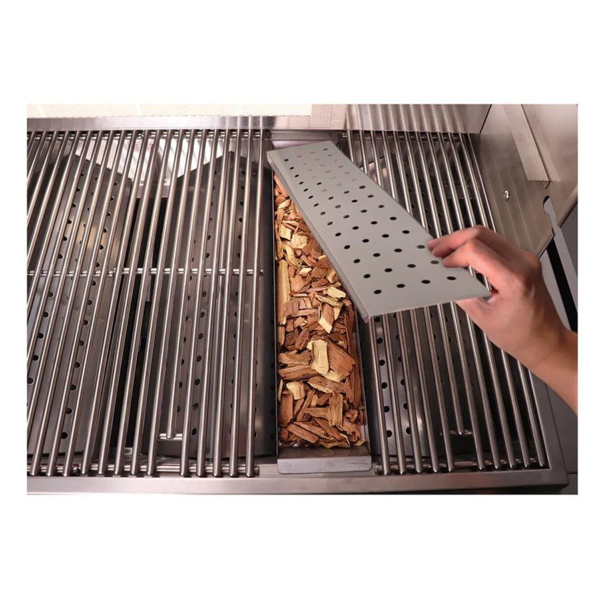 You place this in your grill with your favorite wood chips
